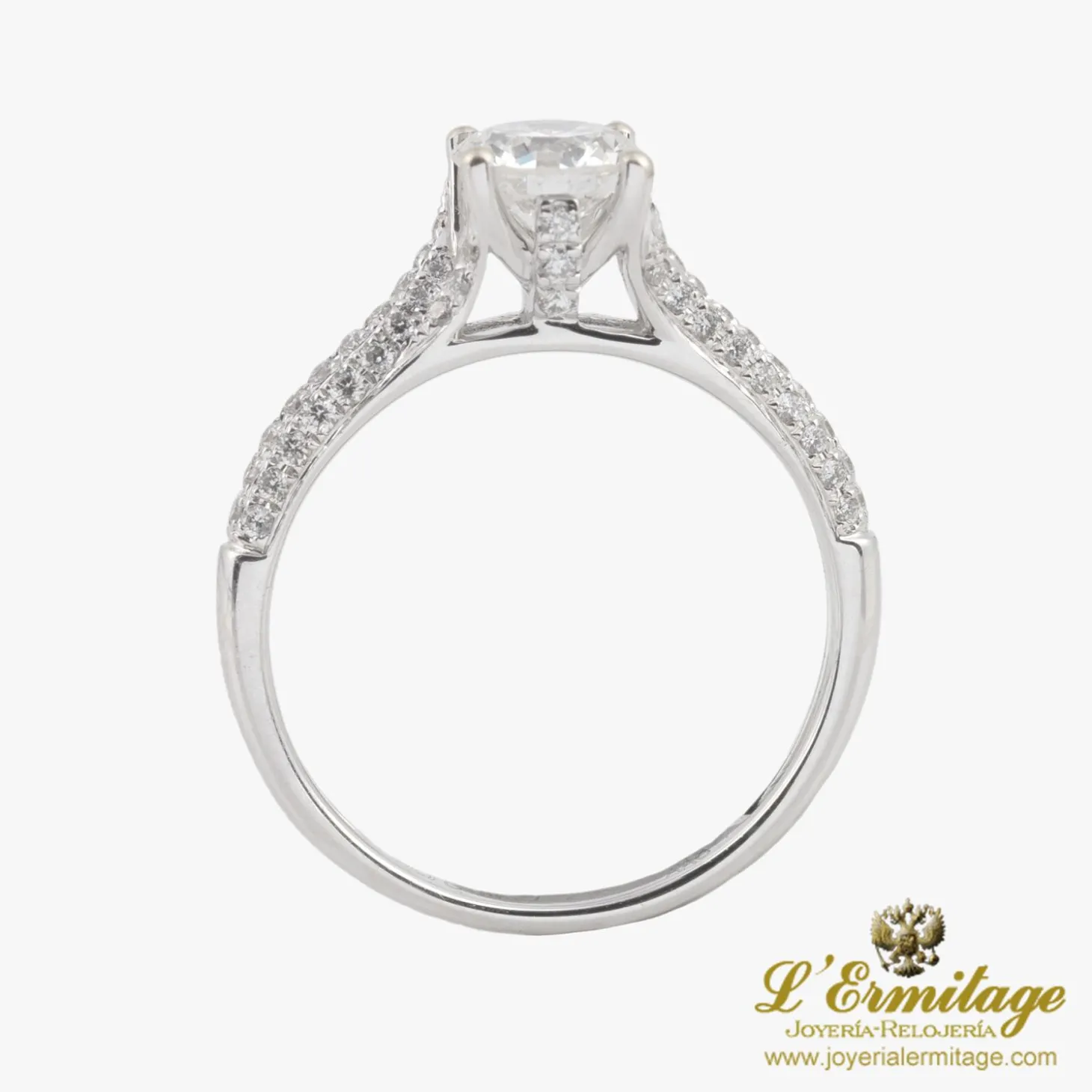 ANILLOS DE COMPROMISO Solitario en oro blanco con brillante color g, pureza vs1, y peso 0,75 ct