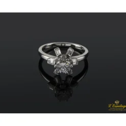 ANILLOS DE COMPROMISO Sortija solitario oro blanco y diamantes color g, pureza si1 y peso 0.65 Cts.