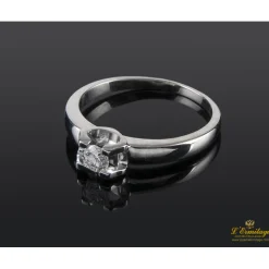 ANILLOS DE COMPROMISO Sortija solitario oro blanco color g, pureza si1 y peso 0,18 cts.