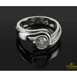 ANILLOS DE COMPROMISO Sortija solitario oro blanco color h, pureza si2 y peso 0,64 cts.