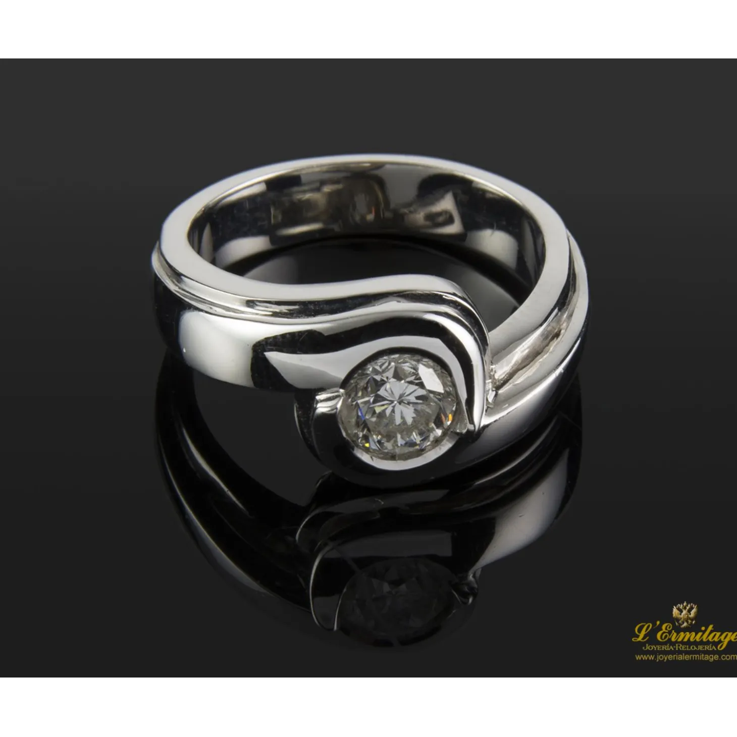 ANILLOS DE COMPROMISO Sortija solitario oro blanco color h, pureza si2 y peso 0,64 cts.