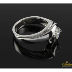 ANILLOS DE COMPROMISO Sortija solitario oro blanco color h, pureza si2 y peso 0,64 cts.