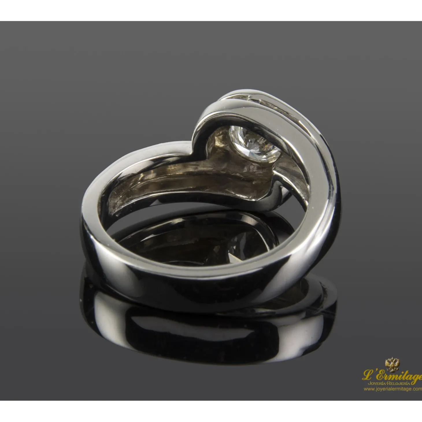 ANILLOS DE COMPROMISO Sortija solitario oro blanco color h, pureza si2 y peso 0,64 cts.