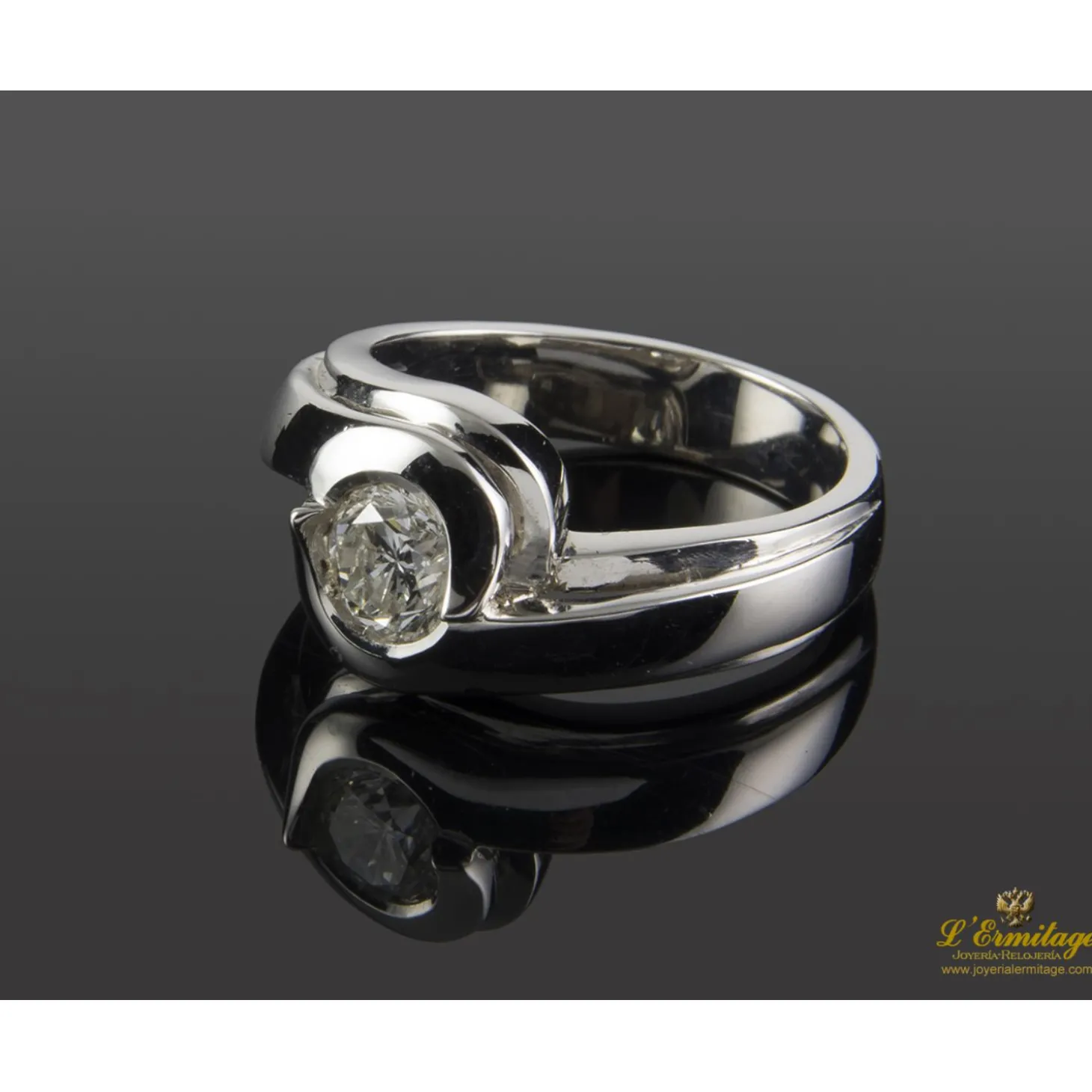 ANILLOS DE COMPROMISO Sortija solitario oro blanco color h, pureza si2 y peso 0,64 cts.