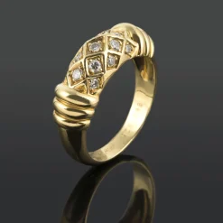 ANILLOS / SORTIJAS Anillo cartier oro amarillo y diamantes. Talla 54.