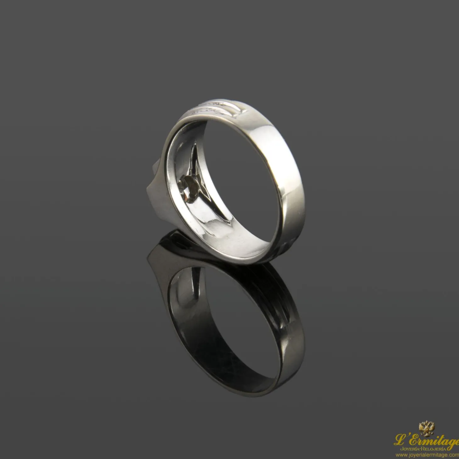 ANILLOS / SORTIJAS Solitario de caballero en oro blanco con un brillante