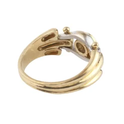 ANILLOS / SORTIJAS Solitario en oro amarillo y oro blanco con un brillante.