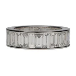 ANILLOS / SORTIJAS Sortija alianza infinity en oro blanco con baguettes. Talla 11.