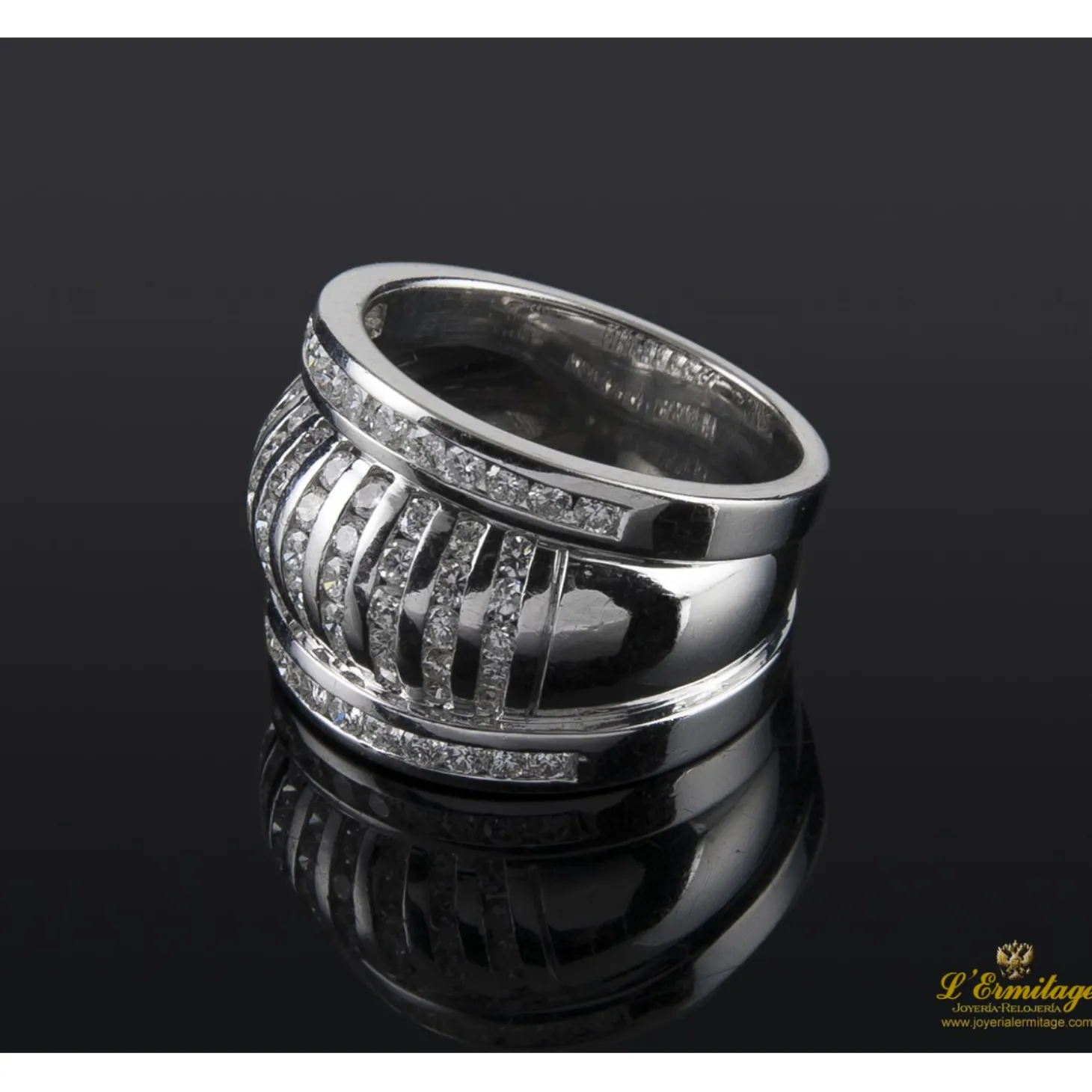 ANILLOS / SORTIJAS Sortija ancha oro blanco y diamantes.