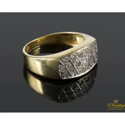 ANILLOS / SORTIJAS Sortija arlequinada realizada en oro amarillo y oro blanco con zirconitas.