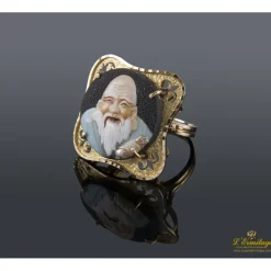 ANILLOS / SORTIJAS Sortija en oro amarillo con motivos de buda en porcelana