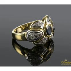 ANILLOS / SORTIJAS Sortija en oro amarillo y oro blanco con un zafiro y brillantes