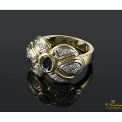 ANILLOS / SORTIJAS Sortija en oro amarillo y oro blanco con un zafiro y brillantes