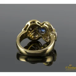 ANILLOS / SORTIJAS Sortija en oro amarillo y oro blanco con un zafiro y brillantes