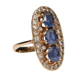 ANILLOS / SORTIJAS Sortija en oro amarillo con zafiros y diamantes. Talla 14.