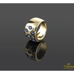 ANILLOS / SORTIJAS Sortija firmada por yanes en oro amarillo con zafiros y brillantes.