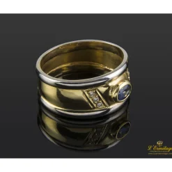 ANILLOS / SORTIJAS Sortija oro amarillo oro blanco zafiro y diamantes.