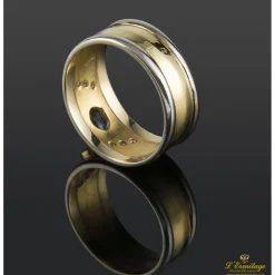 ANILLOS / SORTIJAS Sortija oro amarillo oro blanco zafiro y diamantes.