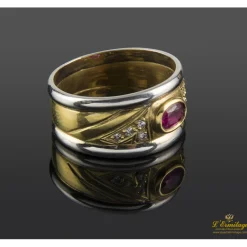 ANILLOS / SORTIJAS Sortija oro amarillo oro blanco rubí cabuchón y diamantes.