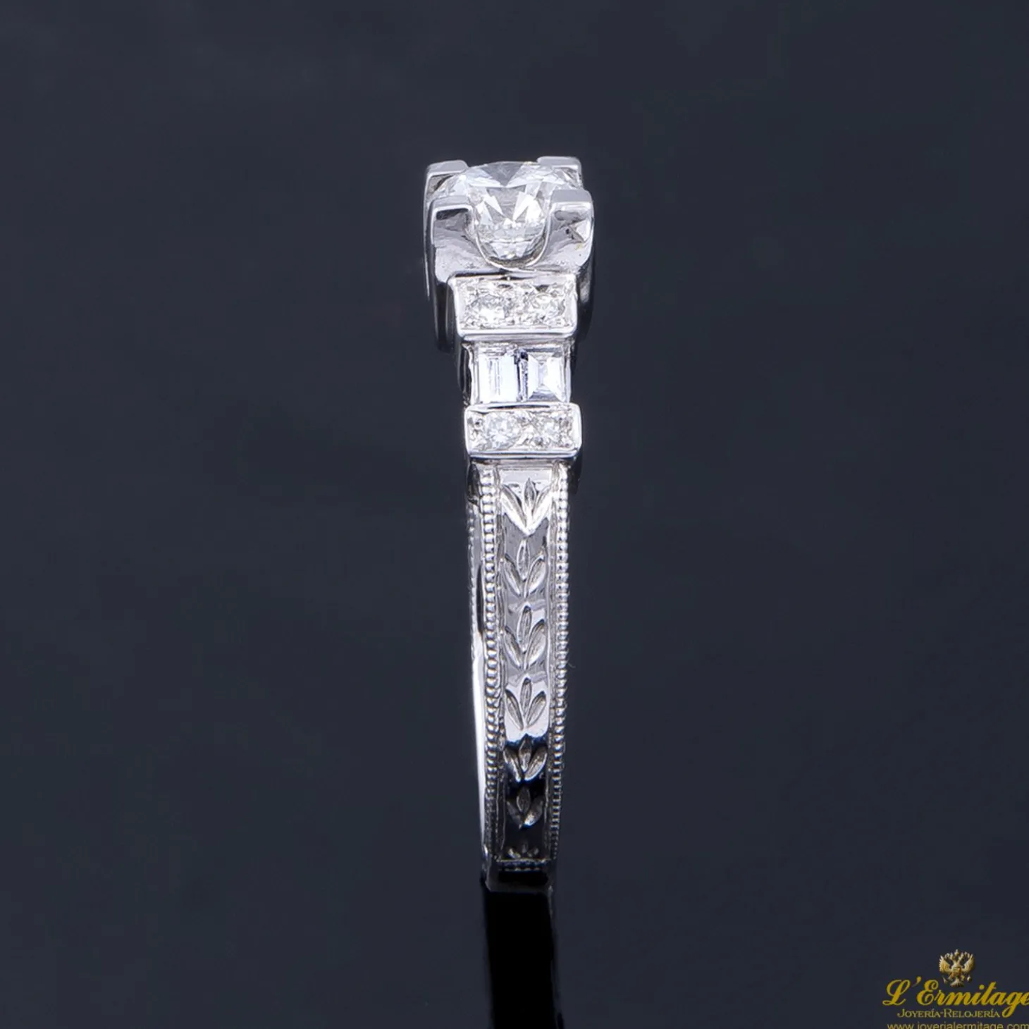 ANILLOS / SORTIJAS Sortija oro blanco y diamantes color g, pureza si1 y peso 0,55 cts.