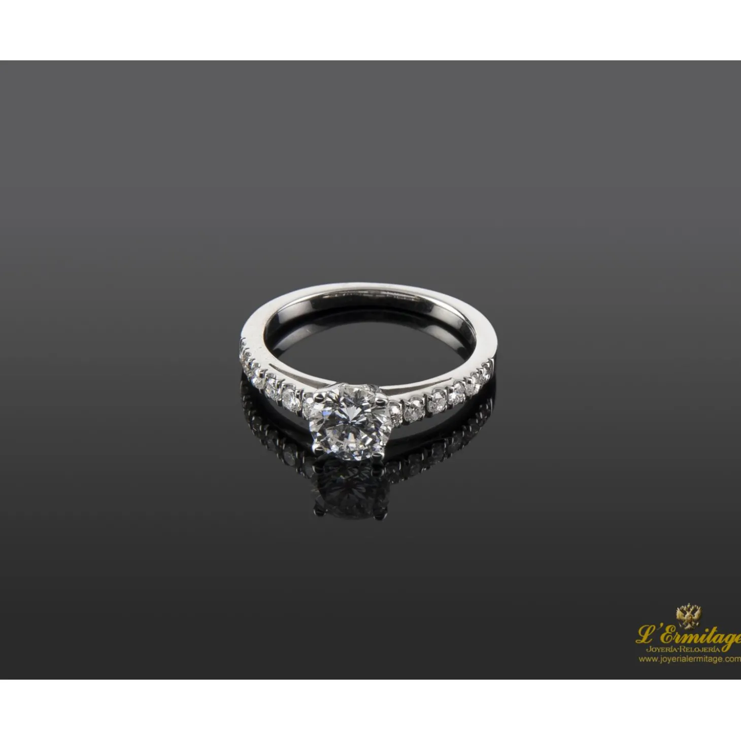 ANILLOS / SORTIJAS Sortija oro blanco y diamantes color f, pureza si1 y peso 0,85 cts.