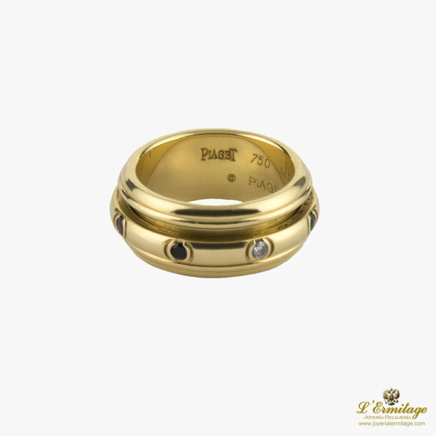 ANILLOS / SORTIJAS Sortija possession de piaget en oro amarillo, rubís, esmeraldas, zafiros y diamantes. Tallam nº 16.