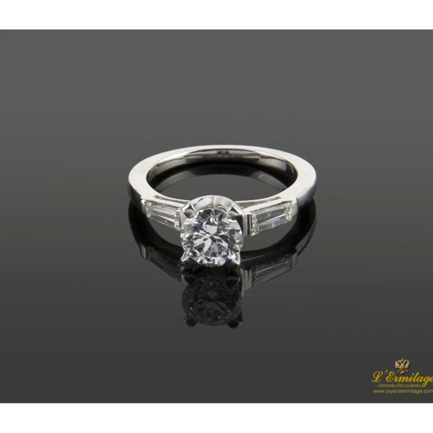 ANILLOS / SORTIJAS Sortija solitario oro blanco y diamantes color f, pureza si2 y peso 0,95 cts.