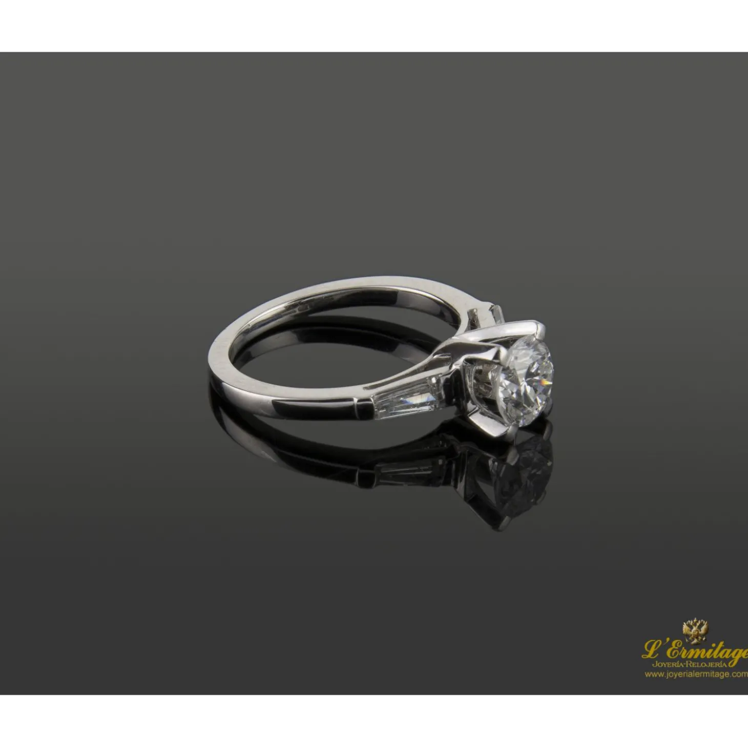 ANILLOS / SORTIJAS Sortija solitario oro blanco y diamantes color f, pureza si2 y peso 0,95 cts.