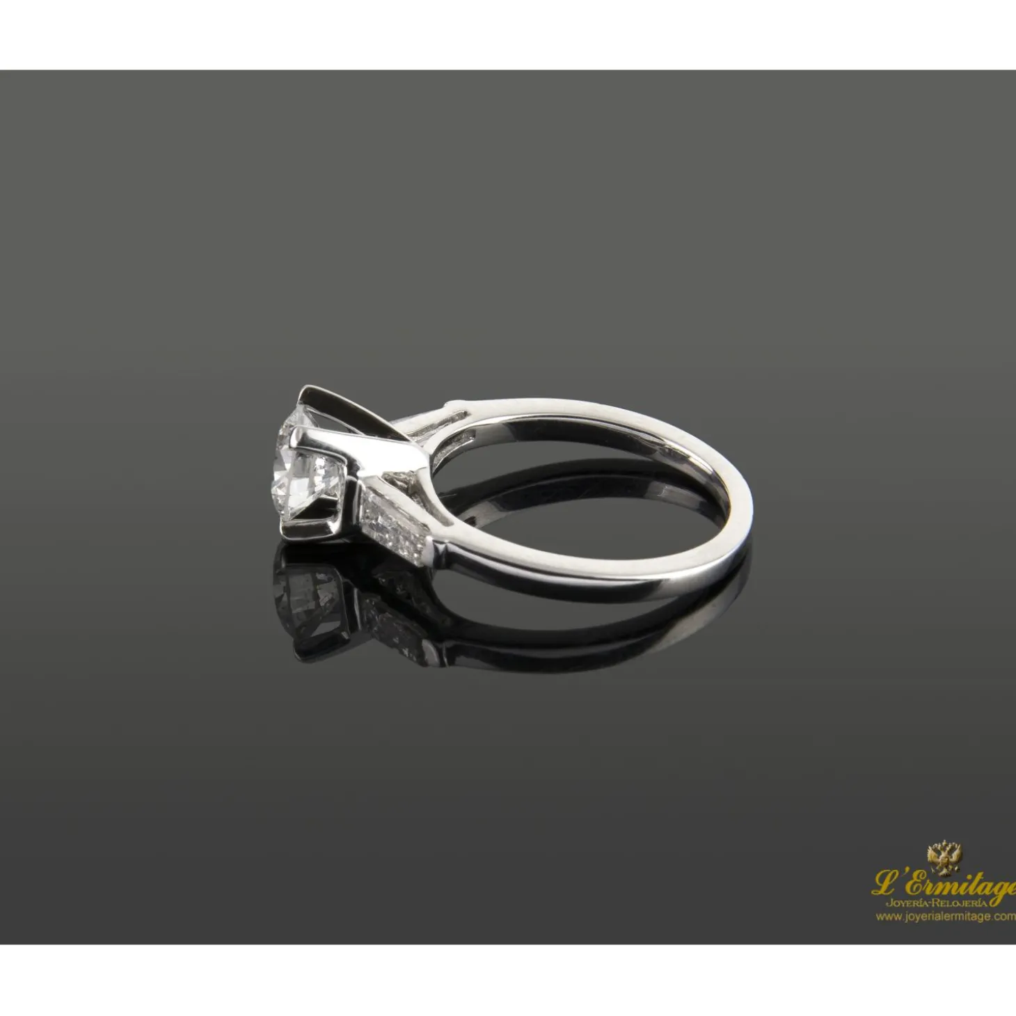 ANILLOS / SORTIJAS Sortija solitario oro blanco y diamantes color f, pureza si2 y peso 0,95 cts.