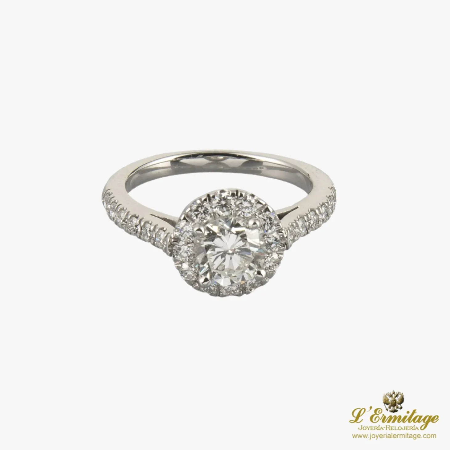 ANILLOS / SORTIJAS Sortija solitario oro blanco y diamantes color g, pureza vs1 y peso 1,06 cts.