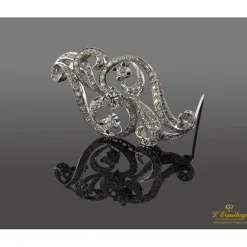 BROCHES / ALFILERES Broche-alfiler oro blanco y diamantes