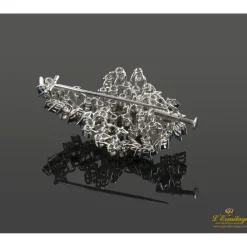 BROCHES / ALFILERES Broche-alfiler oro blanco zafiros y diamantes.