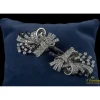 BROCHES / ALFILERES Broche doble clip en oro blanco y brillantes lazos