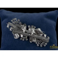 BROCHES / ALFILERES Broche doble clip en oro blanco y brillantes lazos