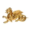 BROCHES / ALFILERES Broche en oro amarillo con forma de grifo animal mitológico.