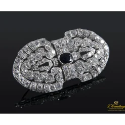 BROCHES / ALFILERES Broche oro blanco y diamantes.