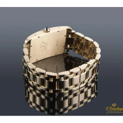 CARTIER Tank americaine oro amarillo cuerda manual caballero