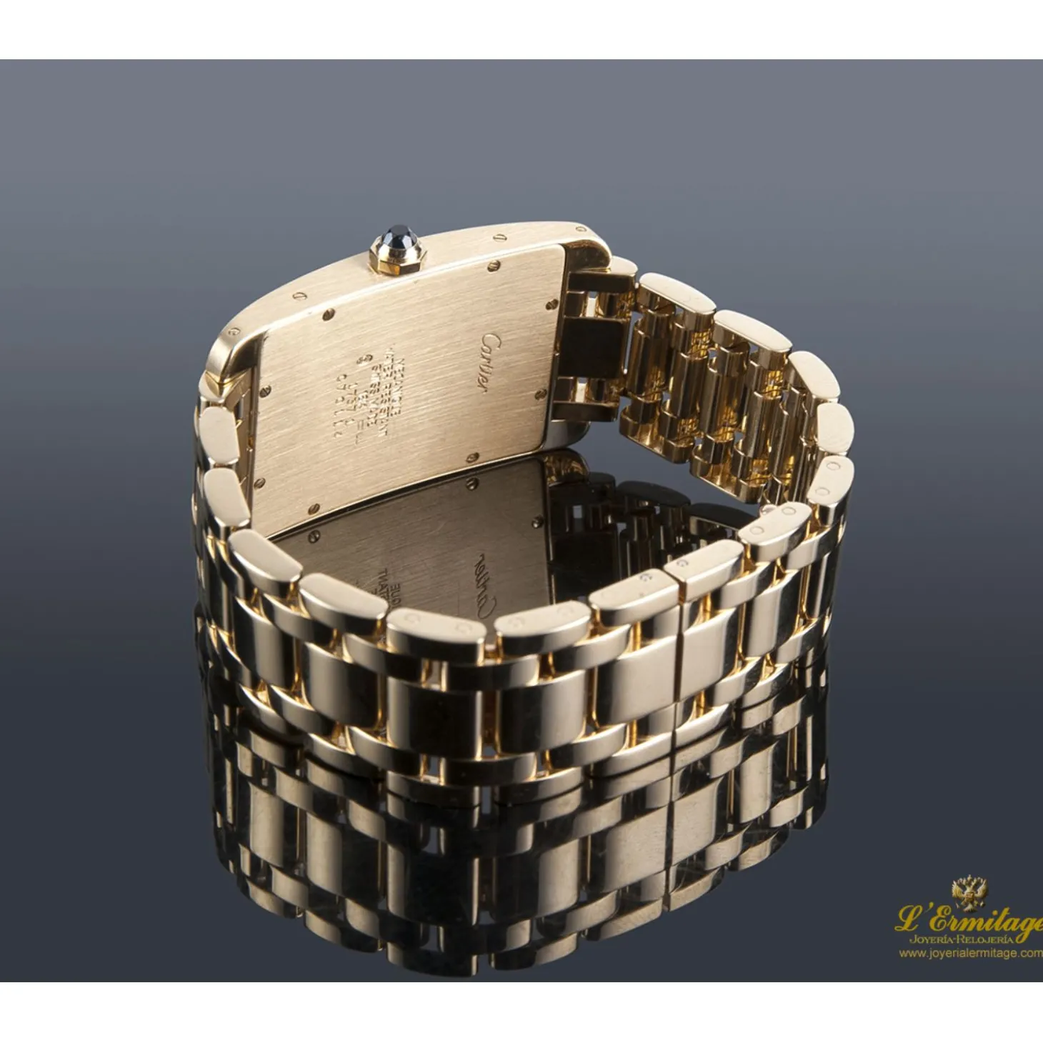 CARTIER Tank americaine oro amarillo cuerda manual caballero