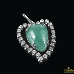 COLGANTES Colgante corazón oro blanco esmeralda y diamantes.