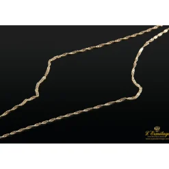 COLLARES Cadena trenzada en oro amarillo.