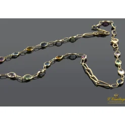 COLLARES Collar oro amarillo con piedras de color.