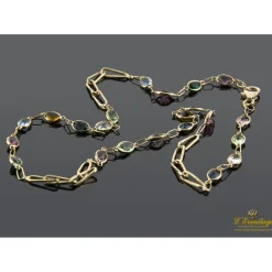 COLLARES Collar oro amarillo con piedras de color.