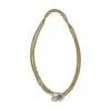 COLLARES Collar pomellato en oro amarillo y oro blanco.