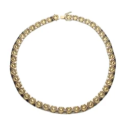 COLLARES Collar realizado en oro amarillo y oro blanco.