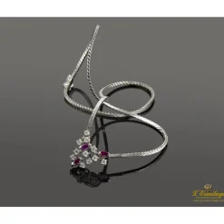 COLLARES Gargantilla oro blanco rubíes y diamantes.