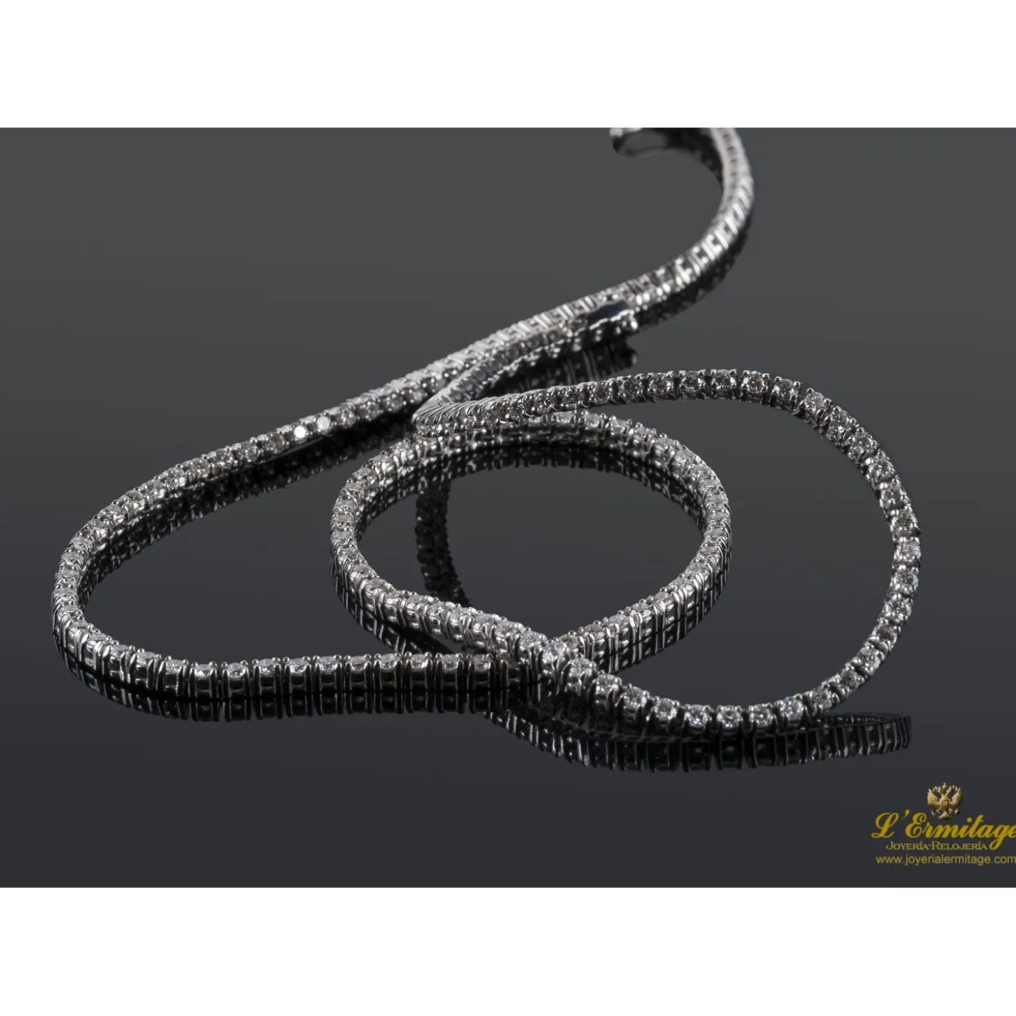 COLLARES Gargantilla riviere oro blanco y diamantes. 40 Cm largo.