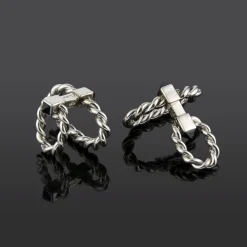 GEMELOS Gemelos cartier oro blanco trenzados.
