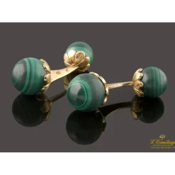 GEMELOS Gemelos con bolas de malaquita montadas en oro amarillo.