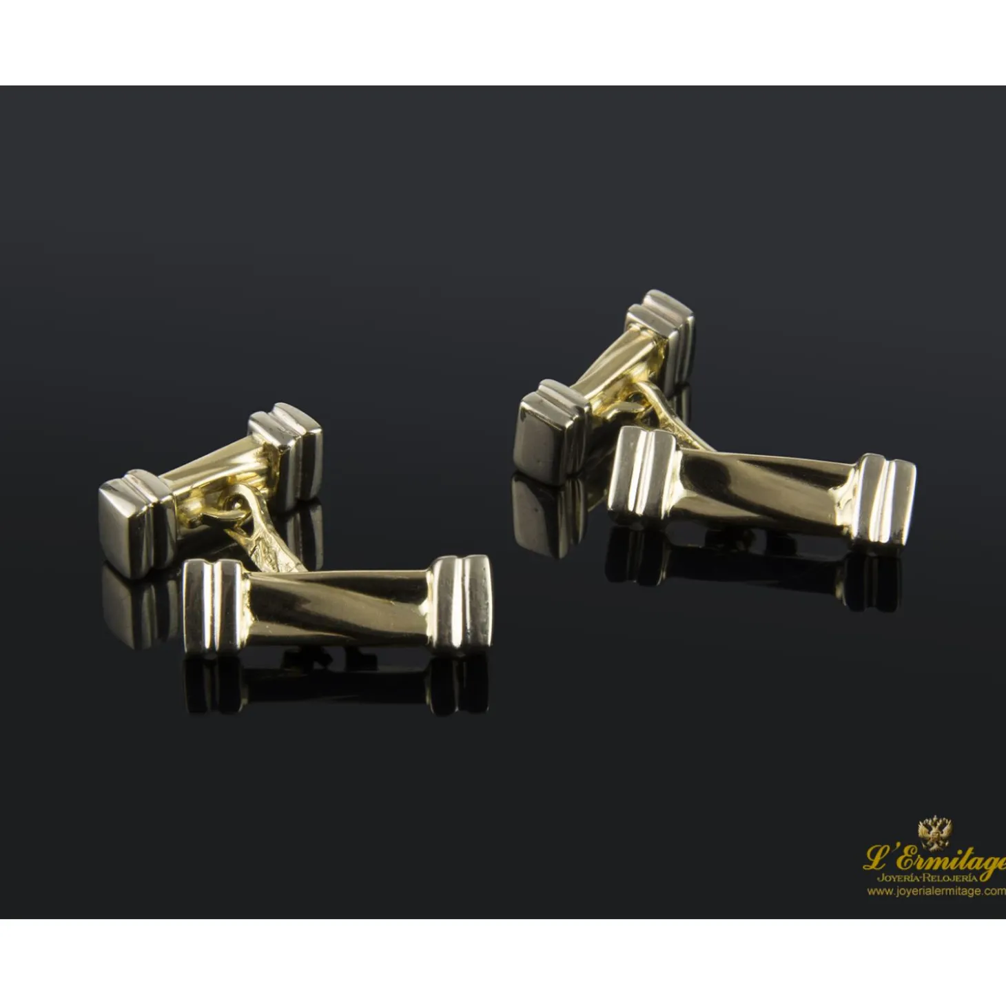 GEMELOS Gemelos en forma de barras realizados en oro amarillo y oro blanco.