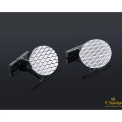 GEMELOS Gemelos realizados en oro blanco en forma oval con  grabado a rombos.